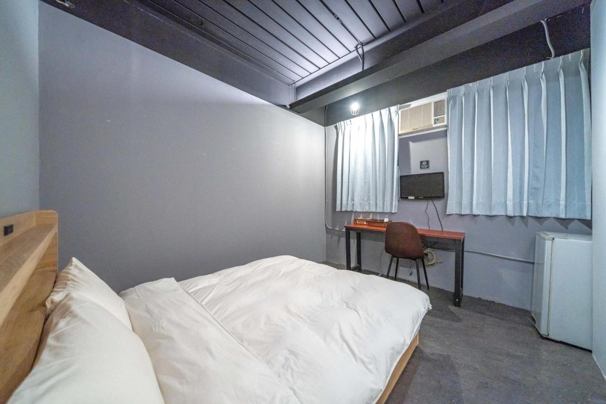Hotel 曼橙驛站 Dalin Habitación foto