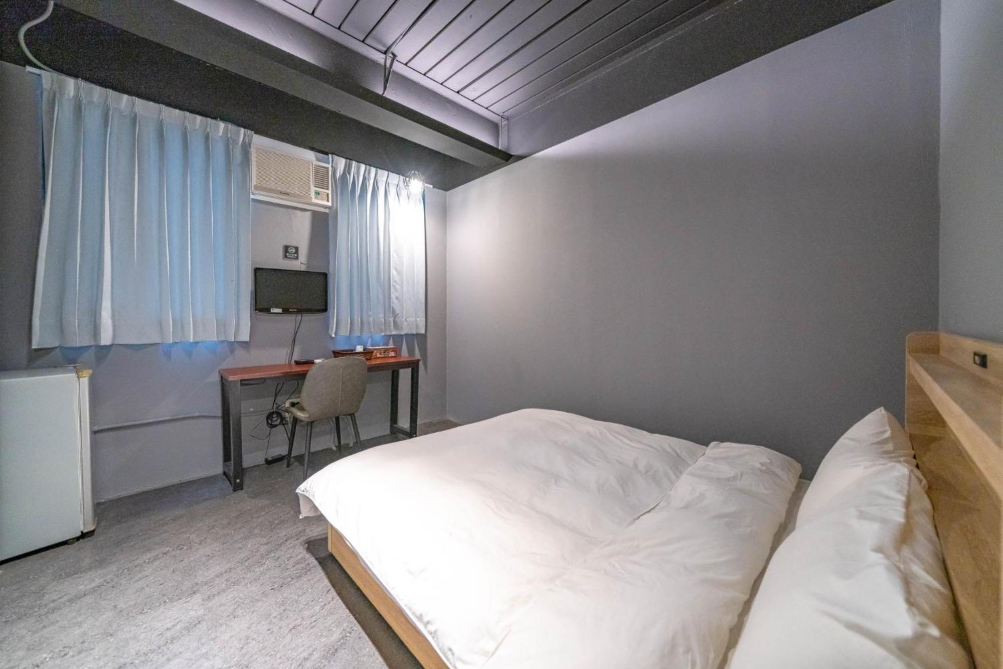 Hotel 曼橙驛站 Dalin Habitación foto