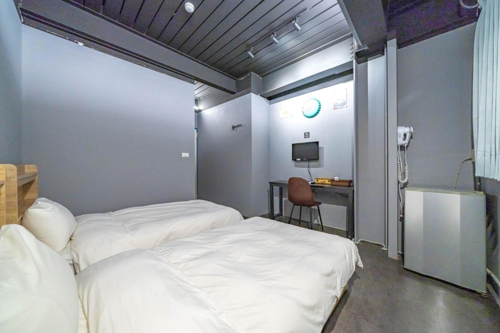 Hotel 曼橙驛站 Dalin Habitación foto