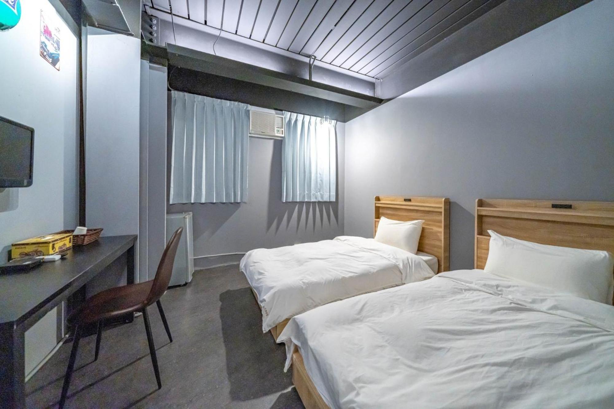 Hotel 曼橙驛站 Dalin Habitación foto
