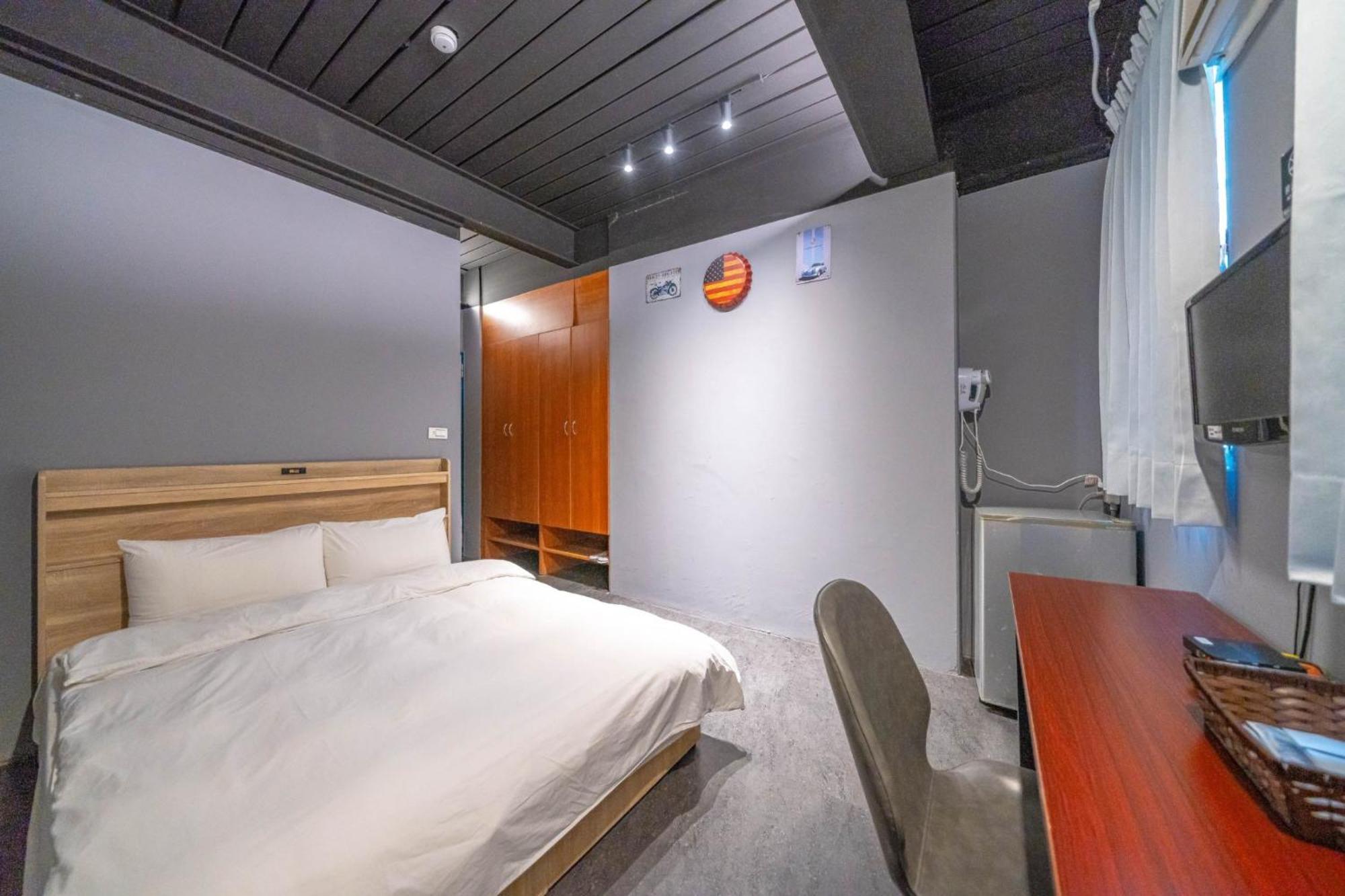 Hotel 曼橙驛站 Dalin Habitación foto